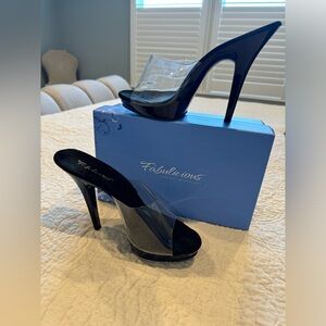 Size 10 clear top and black bottom shoe.